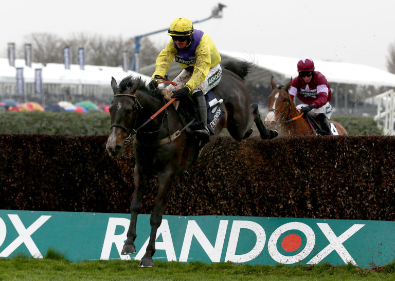 Kalashnikov ridden by jockey Jack Quinlan on the way to winning the Devenish Manifesto Novices' Chase at Aintree in 2019 