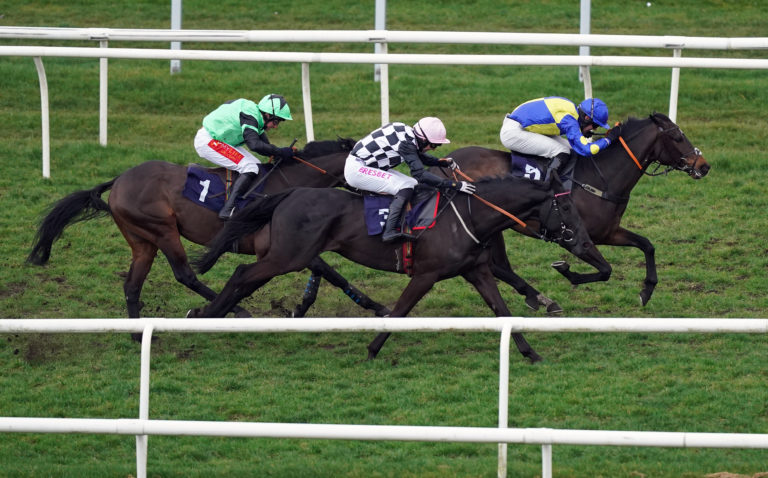 Shared ridden by Paul O'Brien (right) goes on to win the Virgin Bet Daily Money Back Novices' Hurdle at Doncaster Racecourse
