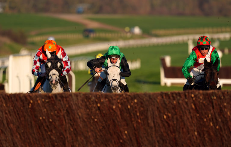 Eva's Oskar(left) during the Dahlbury Handicap Chase at Cheltenham