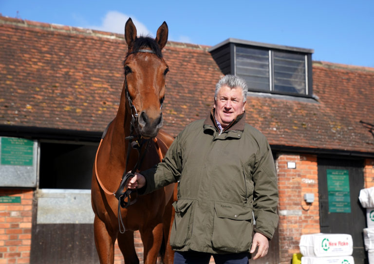 Tahmuras with trainer Paul Nicholls during a visit to Manor Farm Stables, Somerset