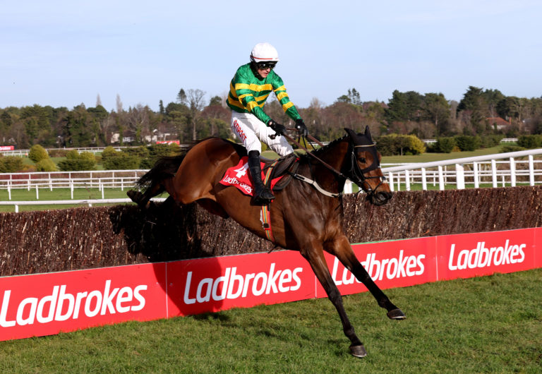 Gentleman De Mee ridden by jockey Danny Mullins on their way to winning the Ladbrokes Dublin Chase