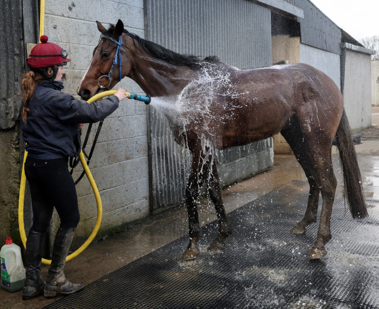 Hewick is washed down after exercise