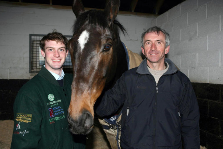 Jockey Niall Madden (left) and Martin Brassil with 2006 Grand National winner Numbersixvalverde
