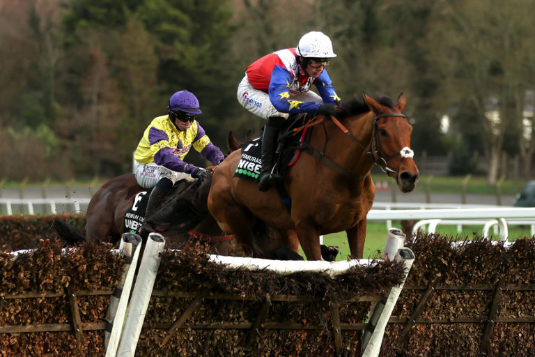 Tahmuras ridden by jockey Harry Cobden on their way to winning the Unibet Tolworth Novices' Hurdle at Sandown Park