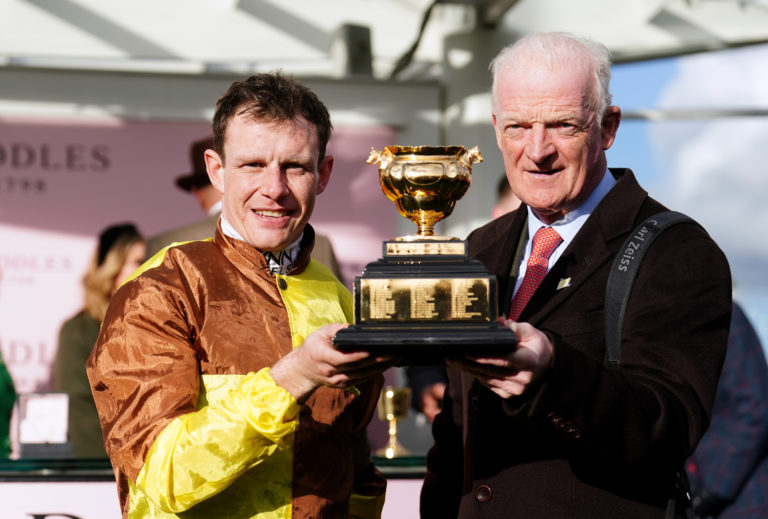 Paul Townend and Willie Mullins celebrate with the Gold Cup