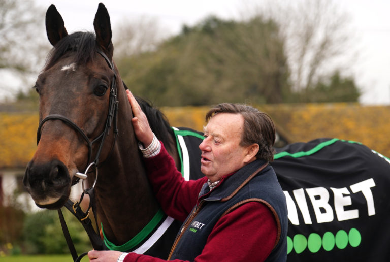 Trainer Nicky Henderson and Constitution Hill during a visit to Nicky Henderson's stables at Seven Barrows in Lambourn