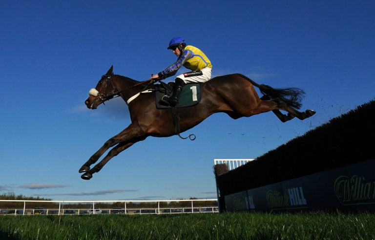 Minella Trump and Brian Hughes jump the last to go on and win the Lyn And Holly's Big Birthday Celebrations Novices' Chase at Catterick