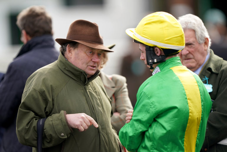 Trainer Nicky Henderson speaks to jockey Rossa Ryan before the Barry Hills Further Flight Stakes at Nottingham racecourse