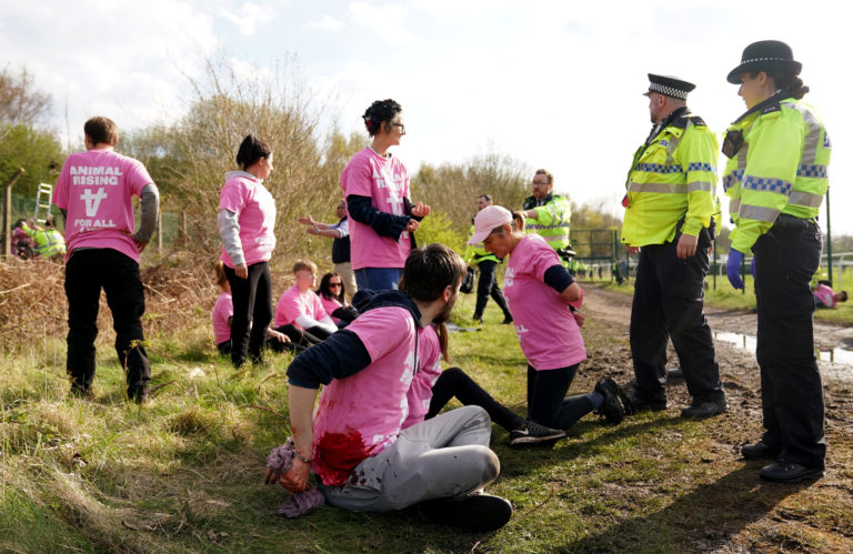 Protesters were detained by police at Aintree