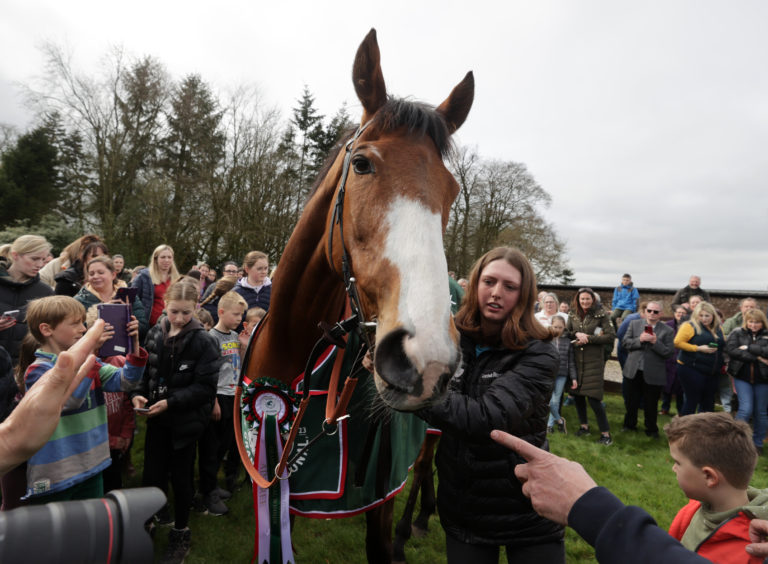 Corach Rambler poses in front of his fans