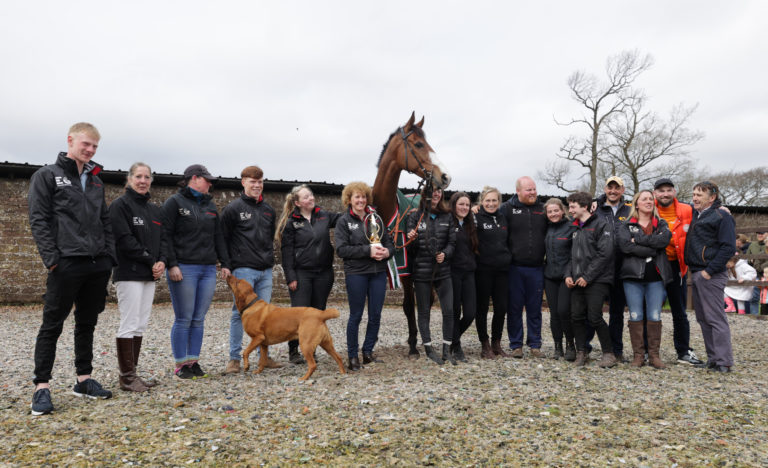 Owners and stable staff with Corach Rambler