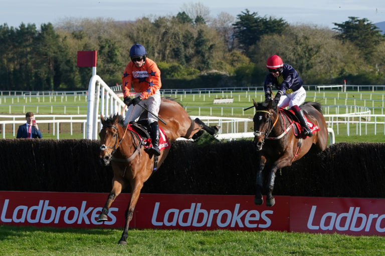 Bravemansgame (left) jumps the last before finishing third in the Punchestown Gold Cup