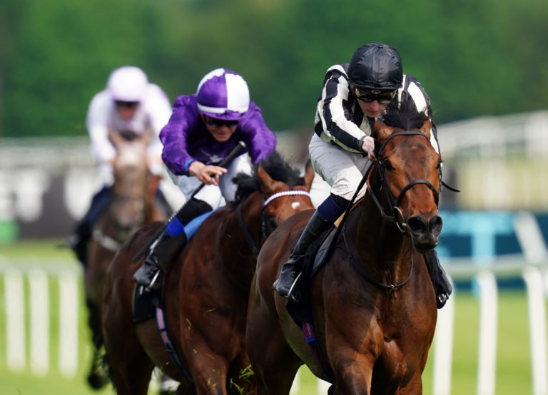 Nothing To Sea ridden by Hector Crouch (right) on their way to winning the Coolmore Stud EBF Maiden Stakes