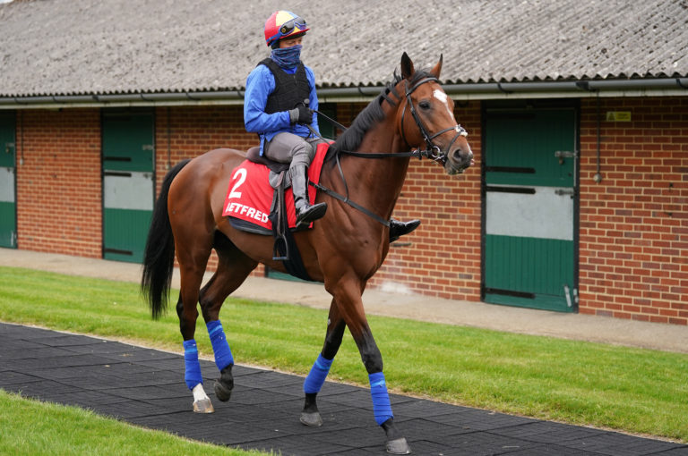 Frankie Dettori and Arrest before galloping at Epsom