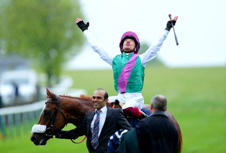 Frankie Dettori celebrates winning the 2000 Guineas on Chaldean