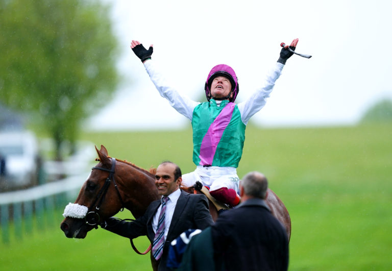 Frankie Dettori celebrates on Chaldean after winning the 2000 Guineas
