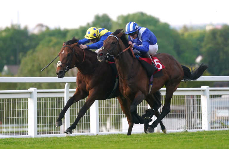 Hukum ridden by jockey Jim Crowley (right) winning the Brigadier Gerard Stakes