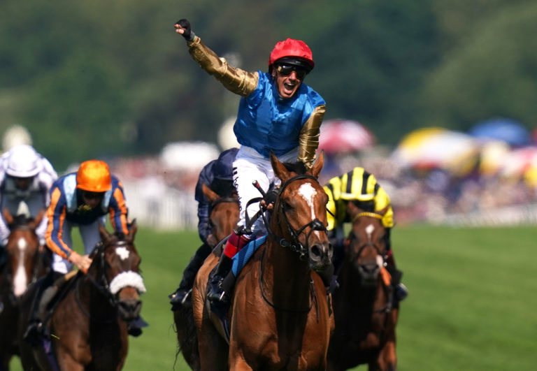 Frankie Dettori celebrates aboard Courage Mon Ami