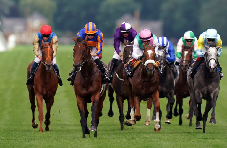 Chaldean (pink silks) finishing second behind Paddington at Royal Ascot