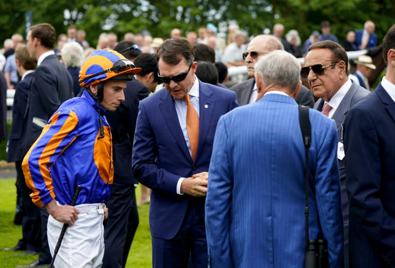 Ryan Moore gives Aidan O'Brien and connections a debrief following the Eclipse