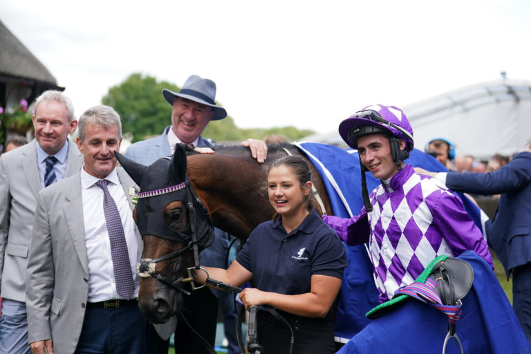 Rossa Ryan (right) and connections celebrate