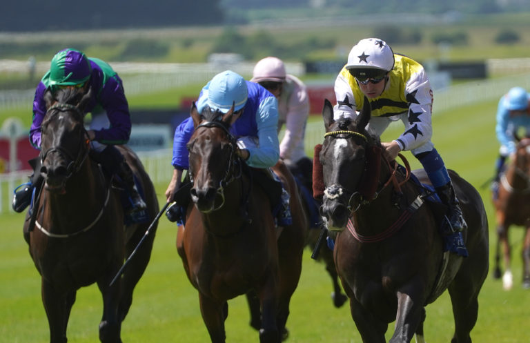 Commanche Falls (right) winning at the Curragh