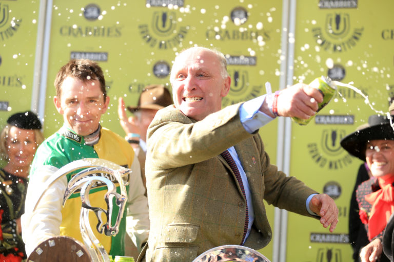 Many Clouds' trainer Oliver Sherwood celebrates after victory Grand National
