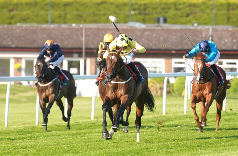 Elite Status winning the National Stakes at Sandown
