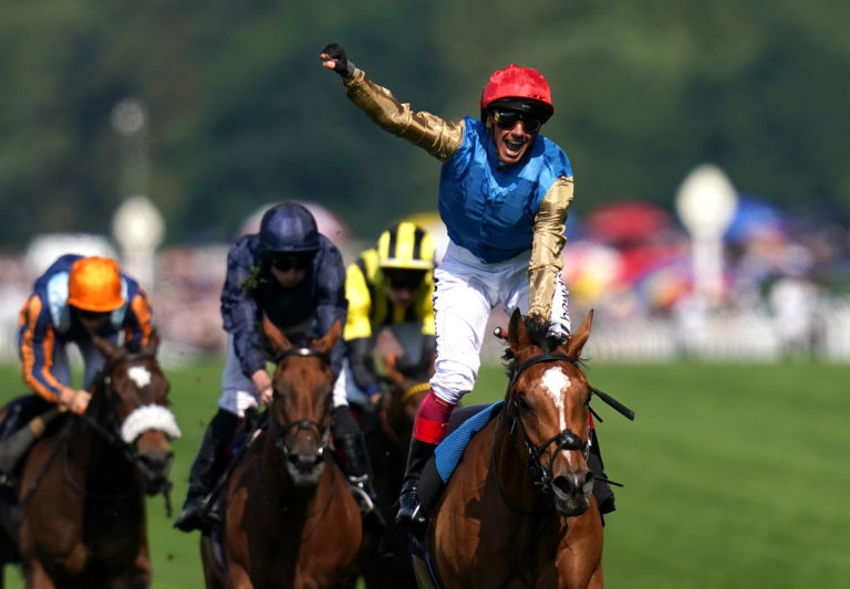 Frankie Dettori salutes the crowd having won his final Gold Cup