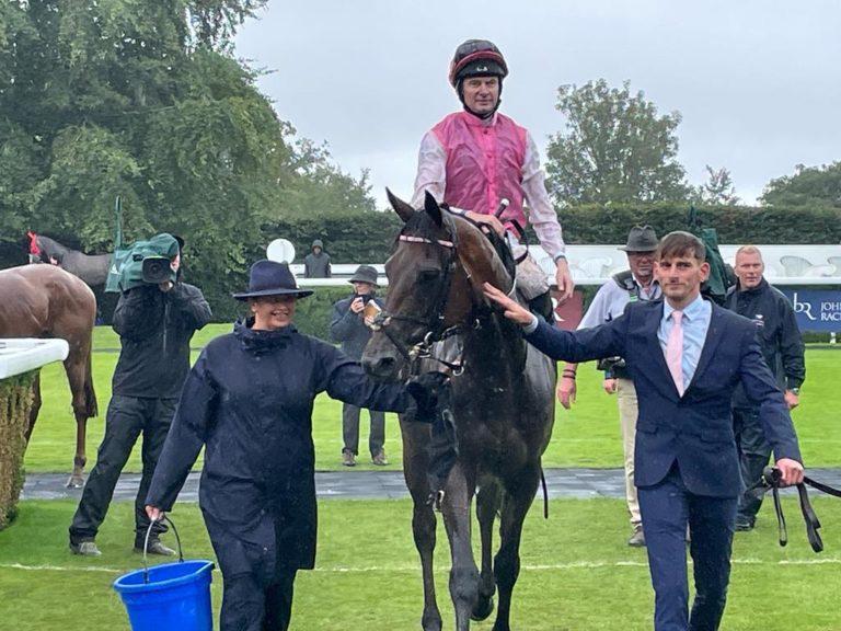 Sweet William returns to the winner's enclosure at Goodwood
