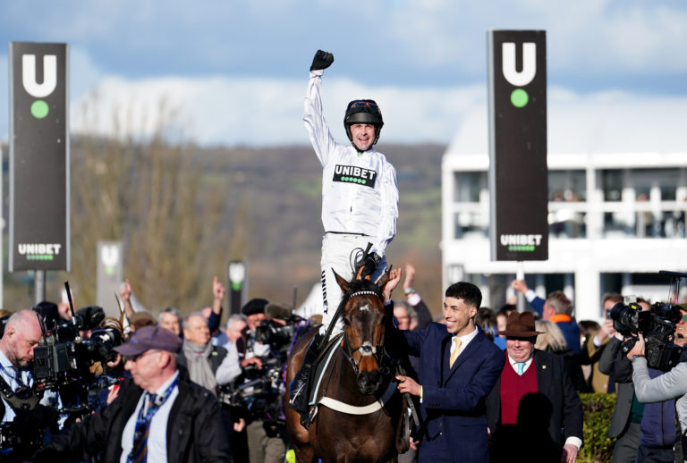 Nico de Boinville celebrates winning the Champion Hurdle with Constitution Hill