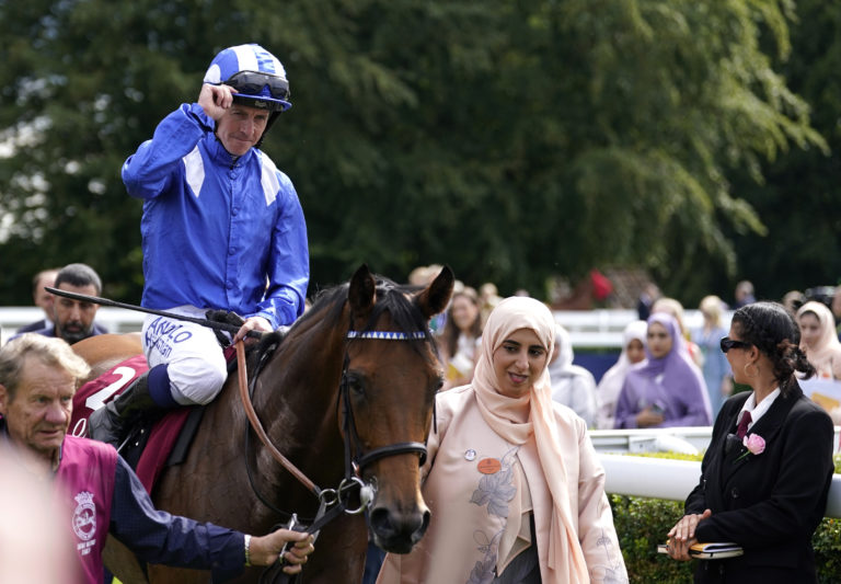 Jim Crowley celebrates winning the Nassau Stakes aboard Al Husn