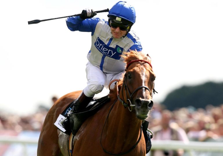 Kevin Darley celebrates winning the Nunthorpe on Reverence