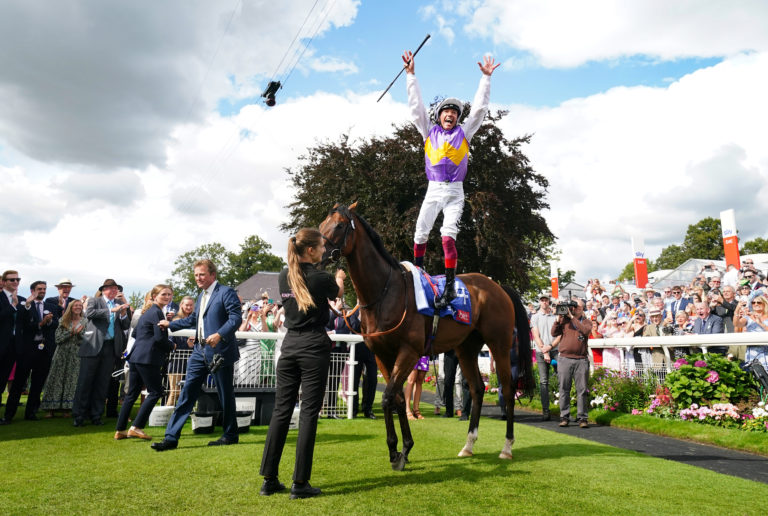 Frankie Dettori jumping for joy from Kinross at York