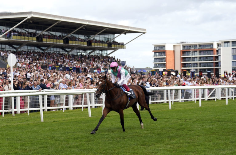 Arrest winning the Geoffrey Freer Stakes at Newbury