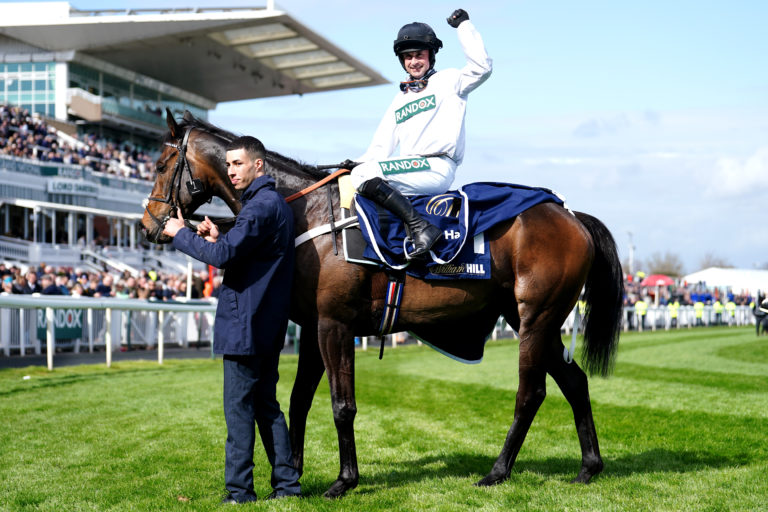 Nico de Boinville celebrates after winning the William Hill Aintree Hurdle on Constitution Hill