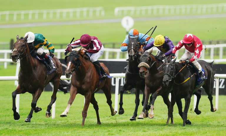 Magellan Strait beat stablemate Dawn Rising (white cap)