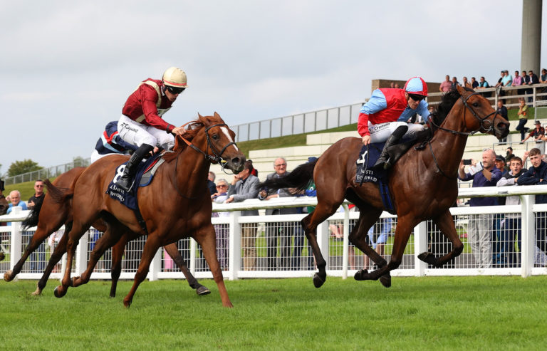 Get Ahead (left) finishing second in the Flying Five Stakes