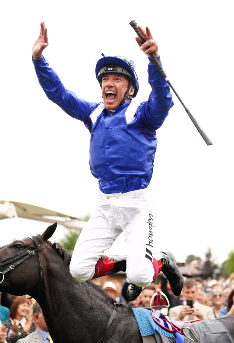 Frankie Dettori performs one his famous flying dismounts