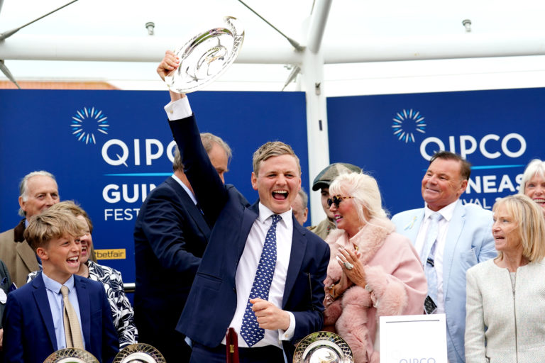 Trainer George Boughey celebrates after Cachet wins the 1000 Guineas