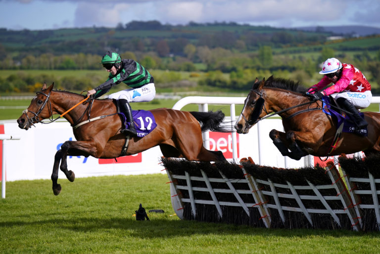 Seddon ridden by jockey Ben Harvey (left) winning at the Punchestown Festival