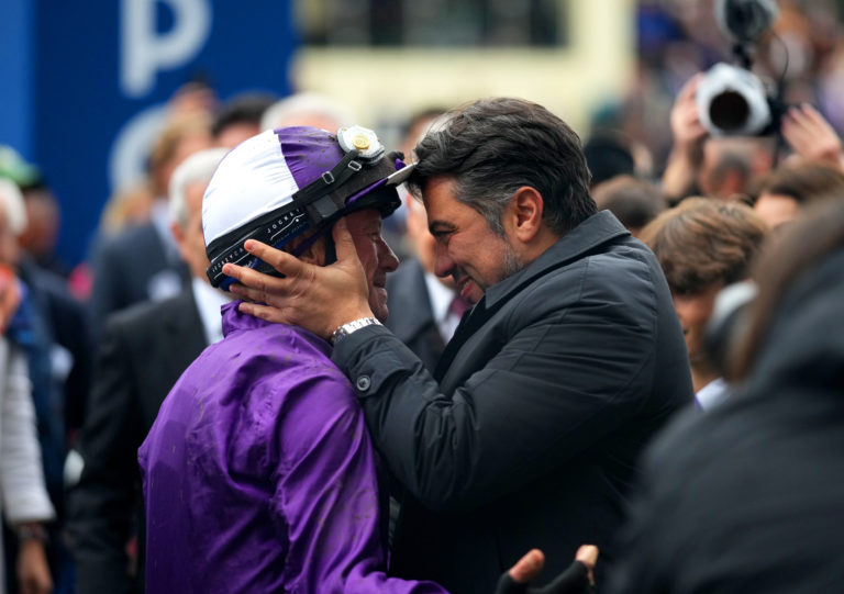 Frankie Dettori is congratulated by owner Kia Joorabchian