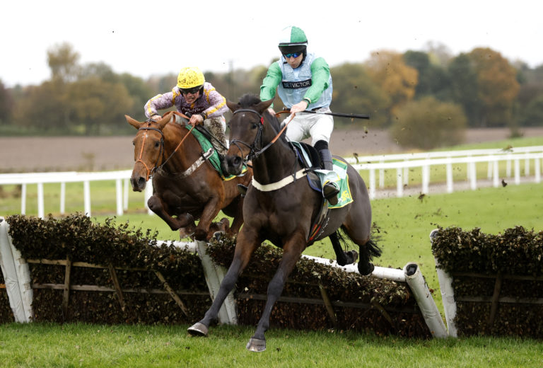 You Wear It Well (right) jumps the final flight at Wetherby