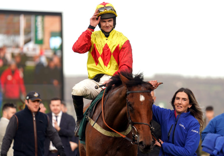 Jockey Brendan Powell celebrates winning aboard Triple Trade 