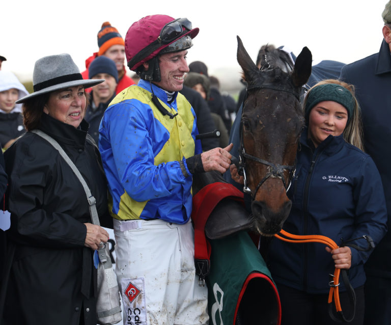 Jockey Jack Kennedy with winning connections after Fortunedefortunata won