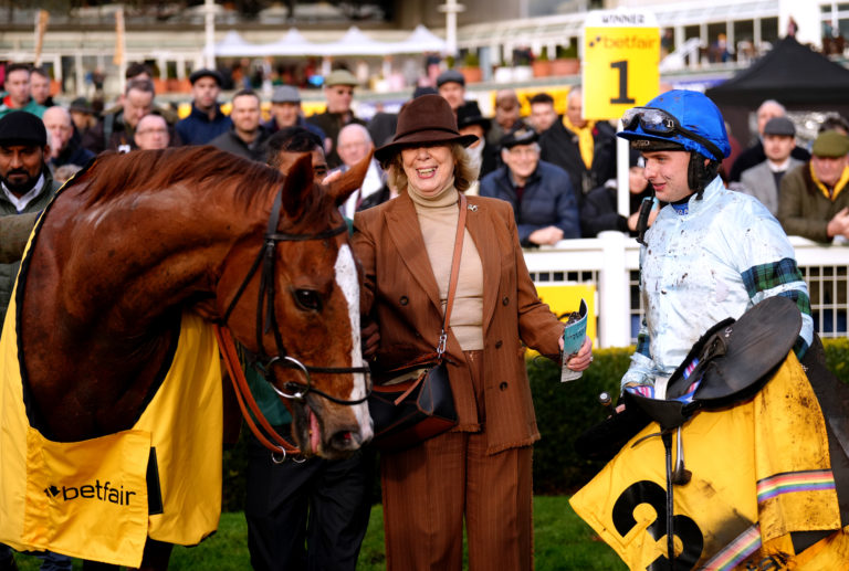 Owner Lady Blyth and jockey Sean Bowen in the winner's enclosure with Not So Sleepy 
