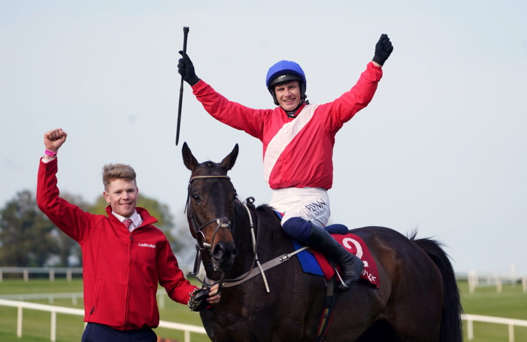 Paul Townend celebrates winning the Ladbrokes Punchestown Gold Cup on Allaho