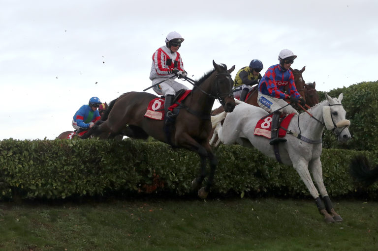Latenightpass and Gina Andrews (left) in action at Cheltenham