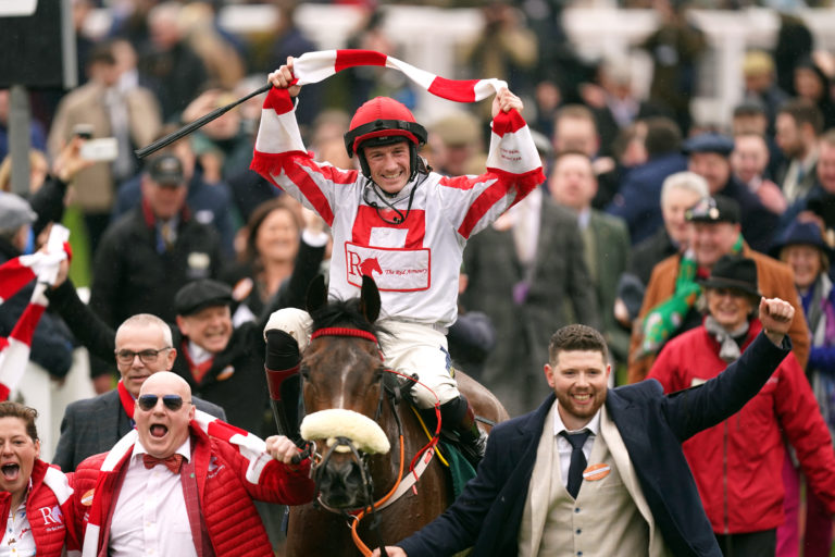 Sam Twiston-Davies celebrates winning the Brown Advisory Novices' Chase aboard The Real Whacker