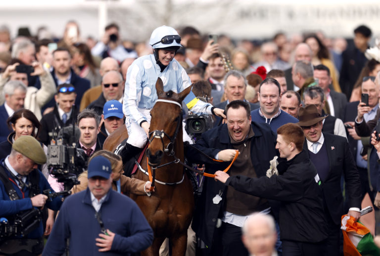 Rachael Blackmore celebrates after winning the Champion Hurdle on Honeysuckle in 2022